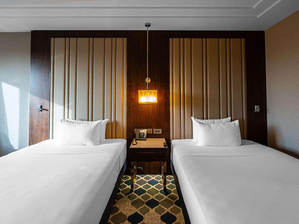Moevenpick Hotel Tașkent Cameră foto